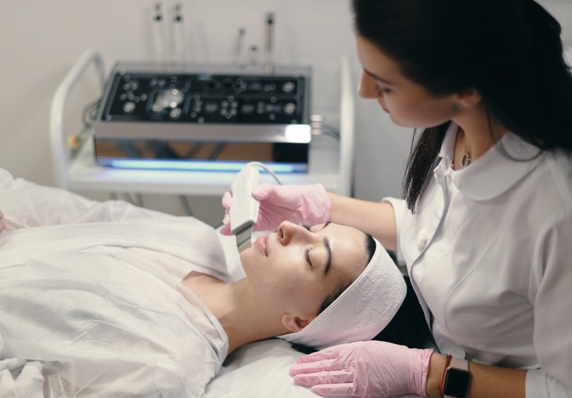 Dermatologist performing advanced facial skin treatment in a clinical setting