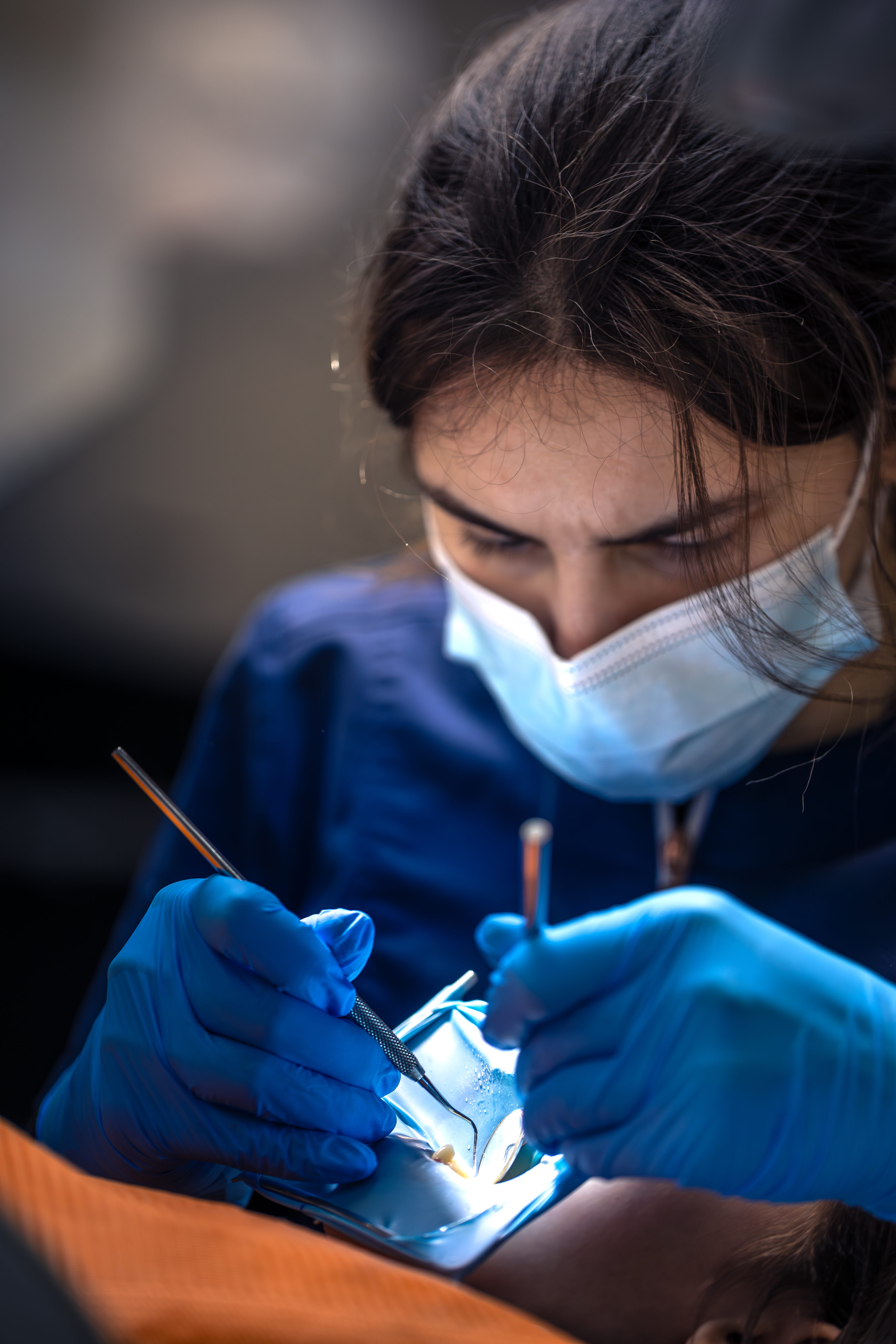 Dermatologist performing pigmentation treatment procedure on face